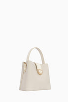 Metal Aksesuarlı Kol Çantası - Bej TUGBA